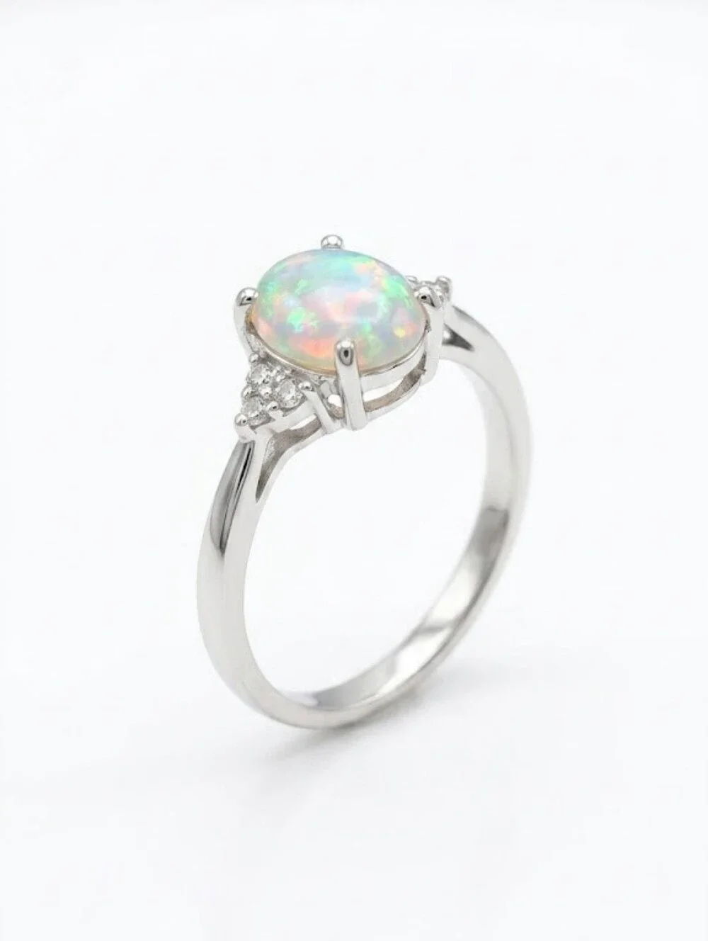 Silver-plated Oval Fire Opal Ring with CZ Accents